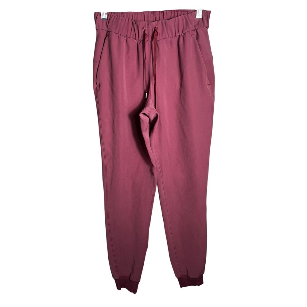 lululemon on the fly jogger pants size2 mauve rose/pink elastic waist drawstring